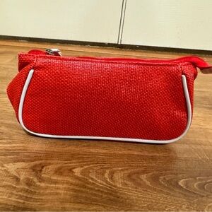 Clarins red and white makeup bag​​​​